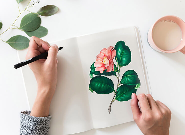 hand painting a flower